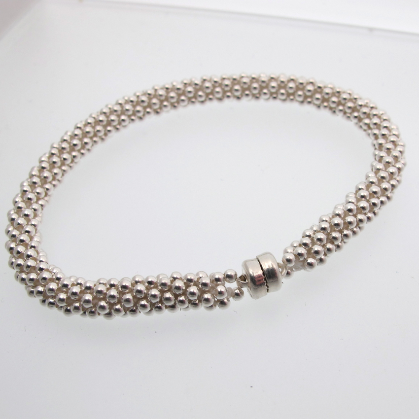 2 mm rund silverpärla