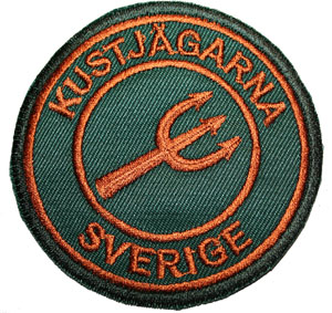 Tygmärke KJ Rund grön/koppar