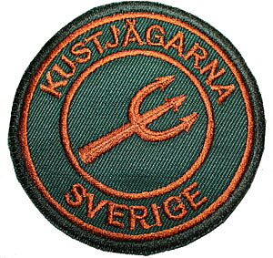 Tygmärke KJ Rund grön/koppar