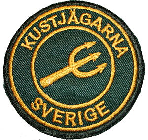 Tygmärke KJ Rund grön/gul
