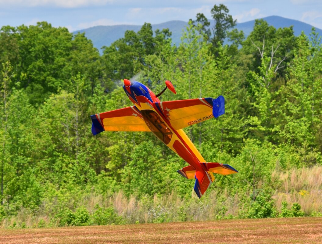 Extreme Flight Extra 300 EXP V2 - Red/Blue/Yellow 1.21m