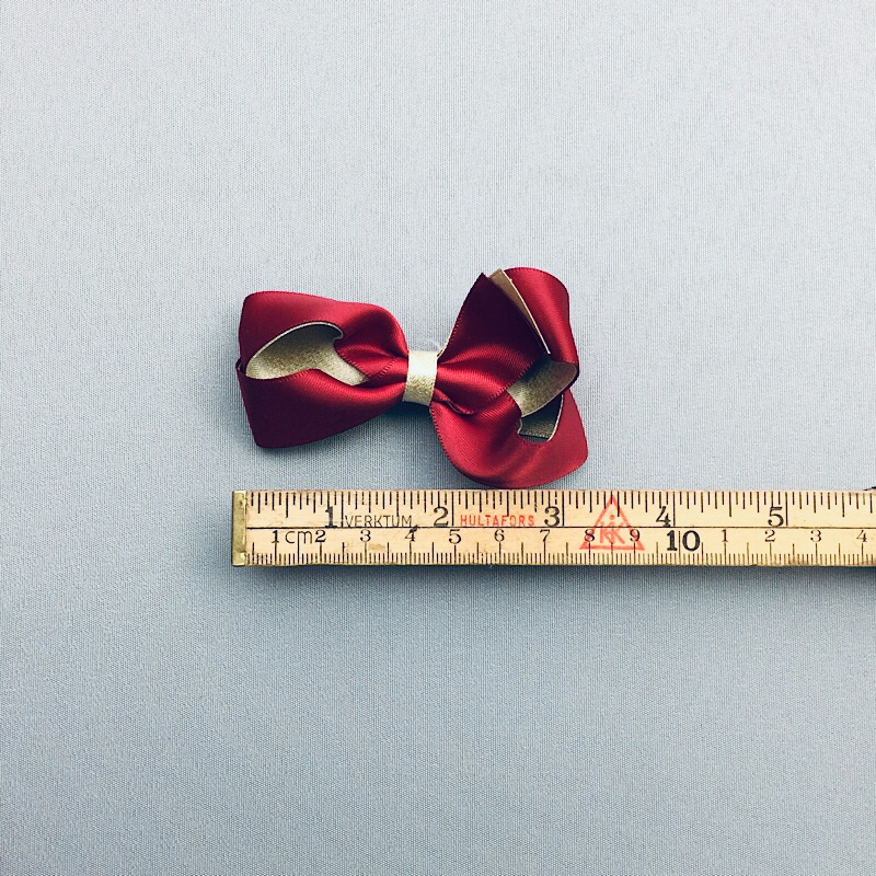 MÖRKRÖD - GULD ROSETT 8 cm - 2