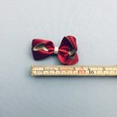 MÖRKRÖD - GULD ROSETT 8 cm