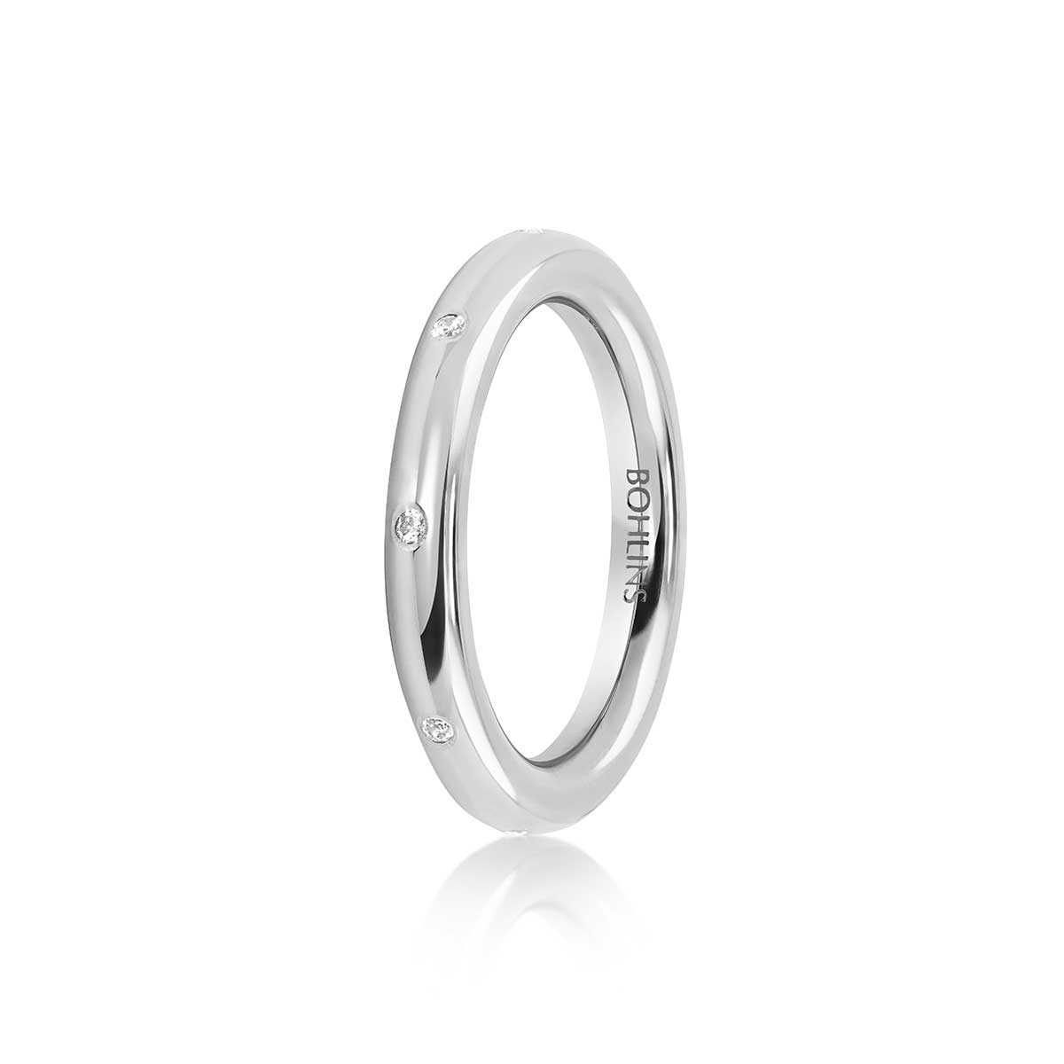 Kraftig rund ring med utsprida diamanter VG