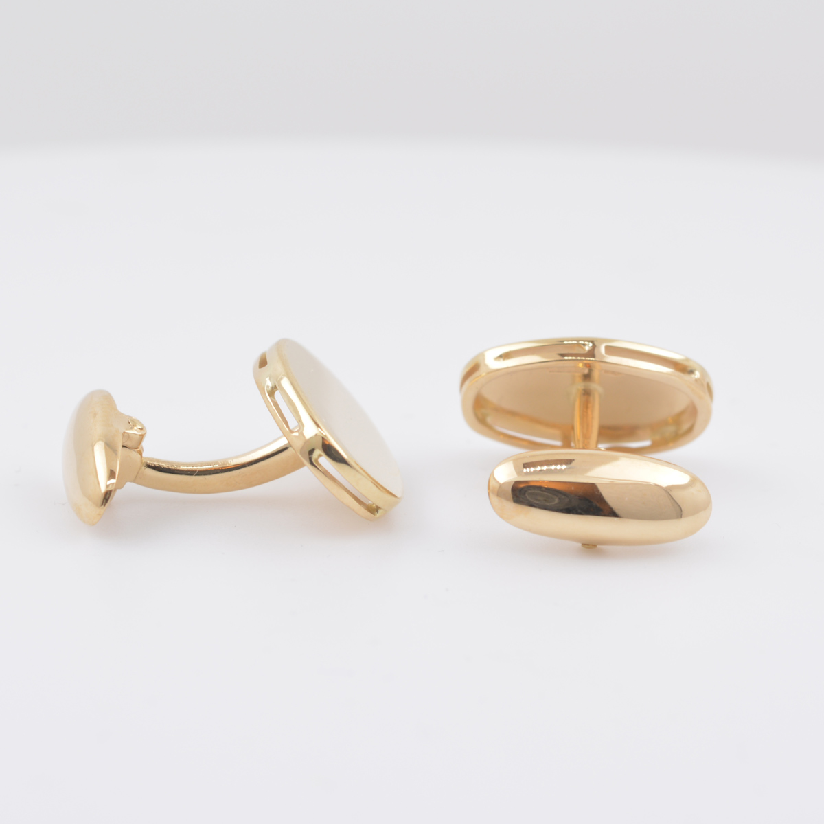 kalvosinnapi kultaa soikea 18k - 5