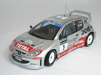 Peugeot 206 WRC (Rally Great Britain 2002) R.Burns-R.Reid  1:18  Sun Star
