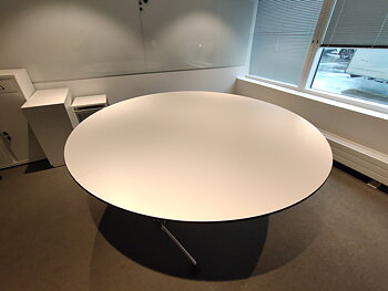 Round two-part conference table with black edge - 180 cm
