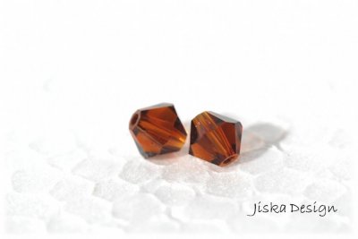 Fasetterad Bicon Topaz 6mm 10st