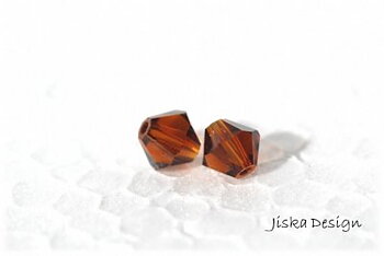 Fasetterad Bicon Topaz 6mm 10st