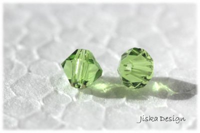 Fasetterad Bicon Light Green 6mm 10st