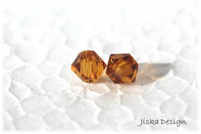 Fasetterad Bicon Light Topaz 6mm 10st