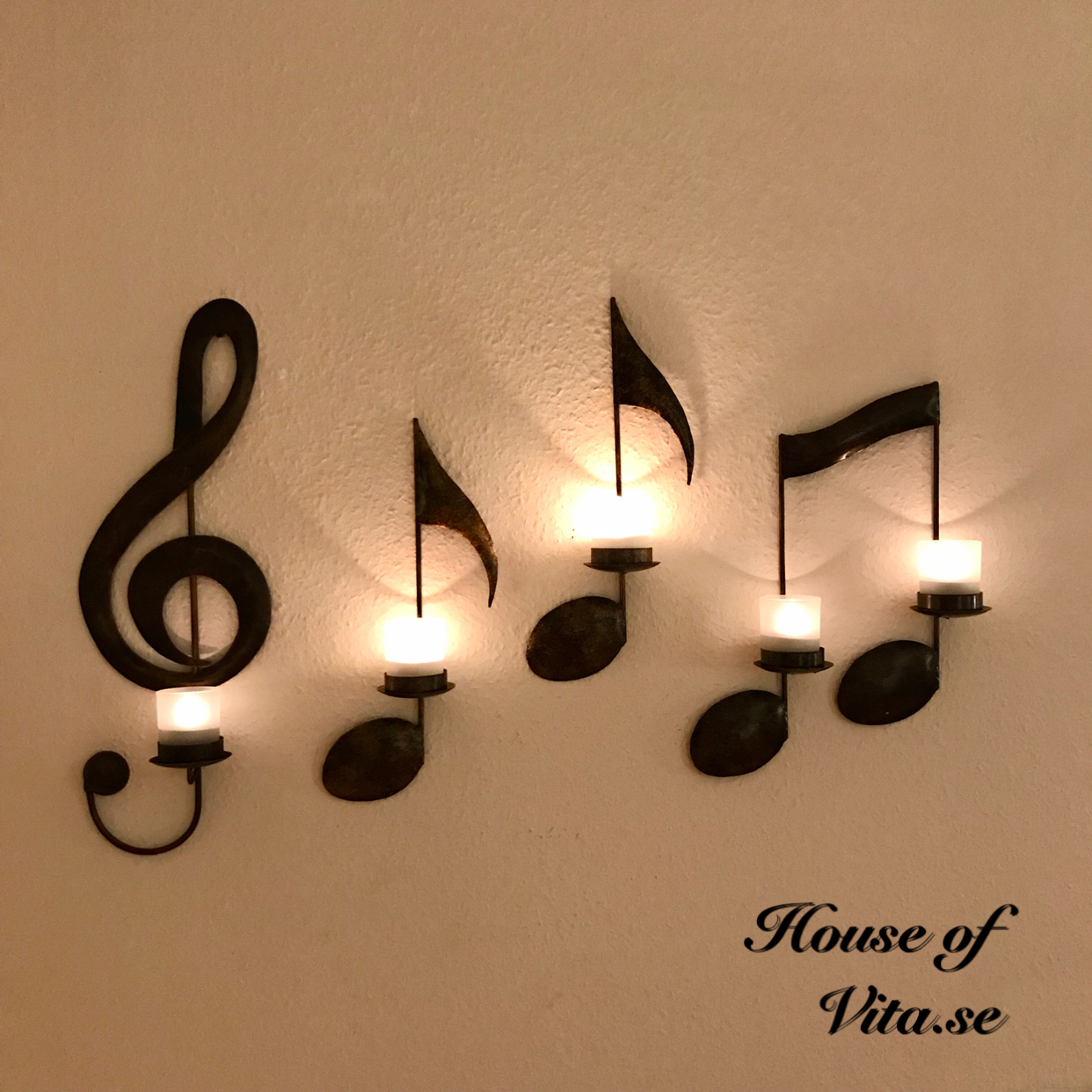 Candlestick G-clef in hammered sheet metal