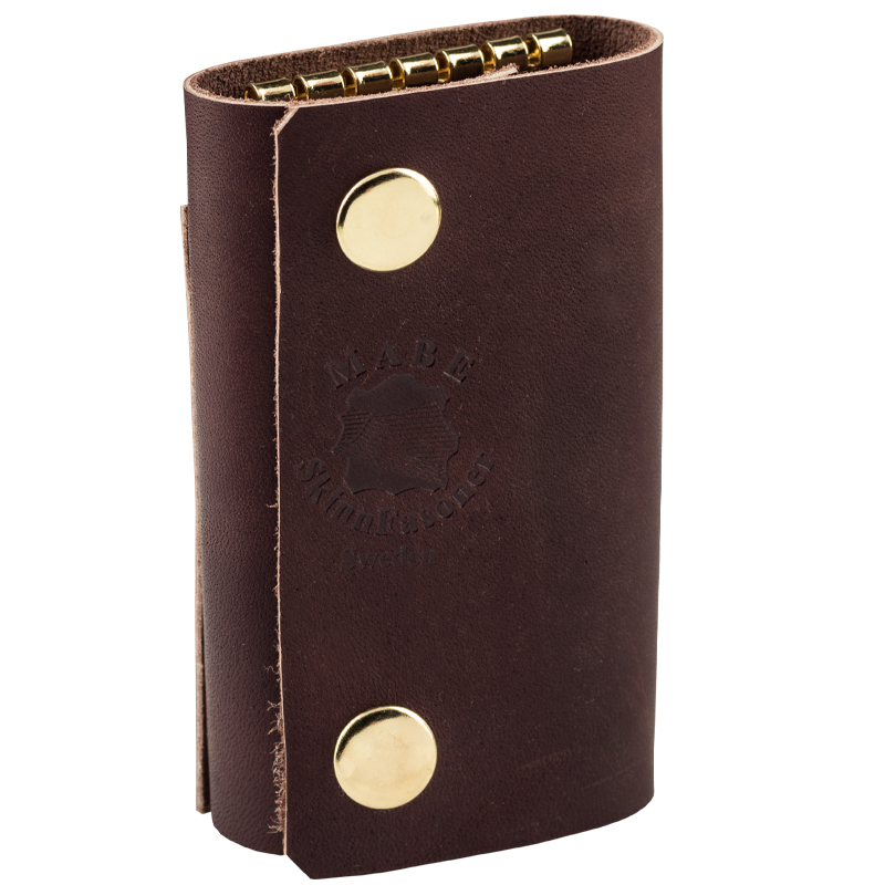 Key holder with compartment in dark brown/gold