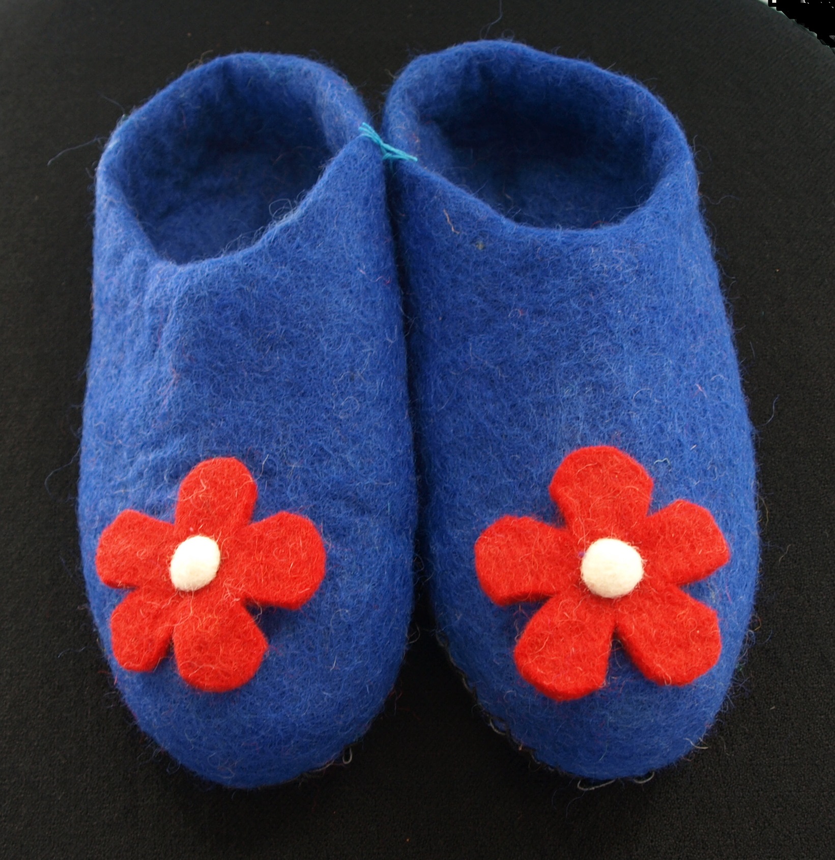Tovade tofflor blå med blomma