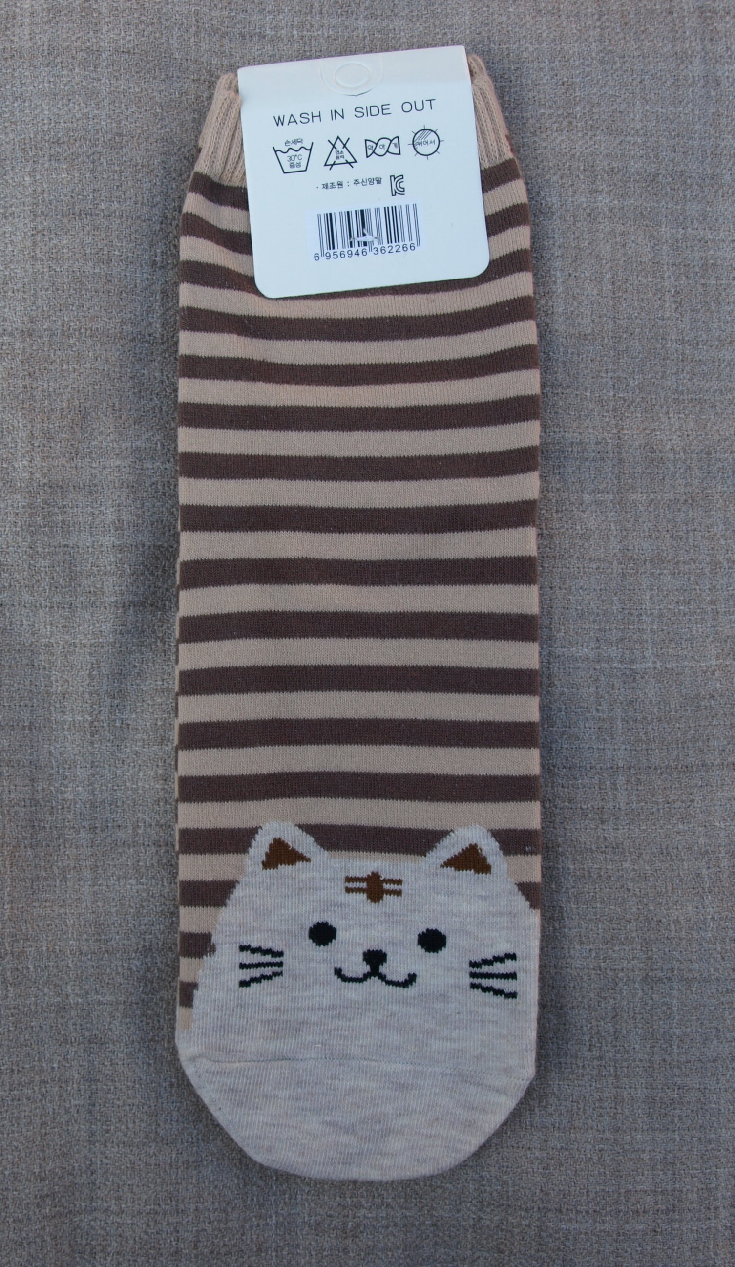 Strumpa med kattansikte beige