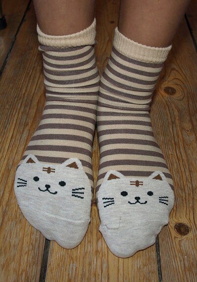 Strumpa med kattansikte beige