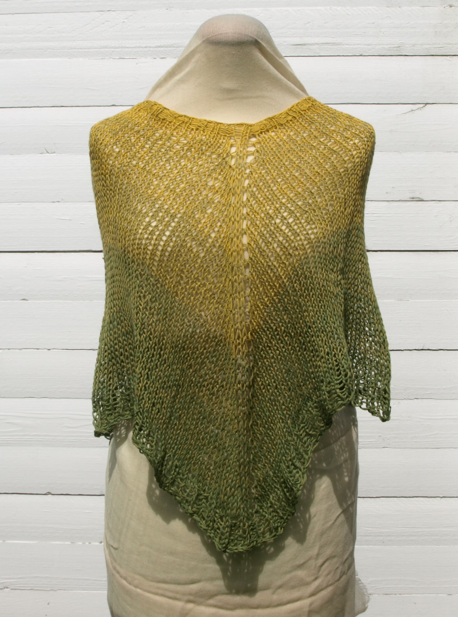 Poncho av bomullsgarn