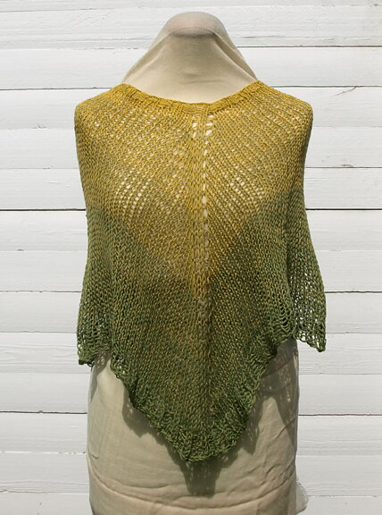 Poncho av bomullsgarn