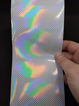 Holografische folie met vissenschub patroon