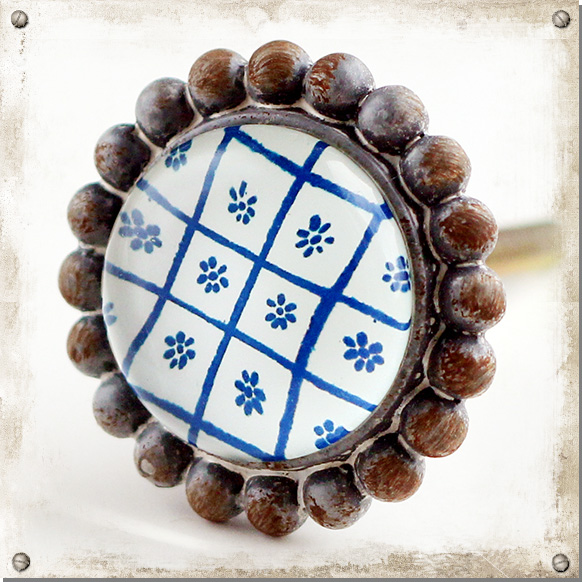 Metallknopp med glas, duk