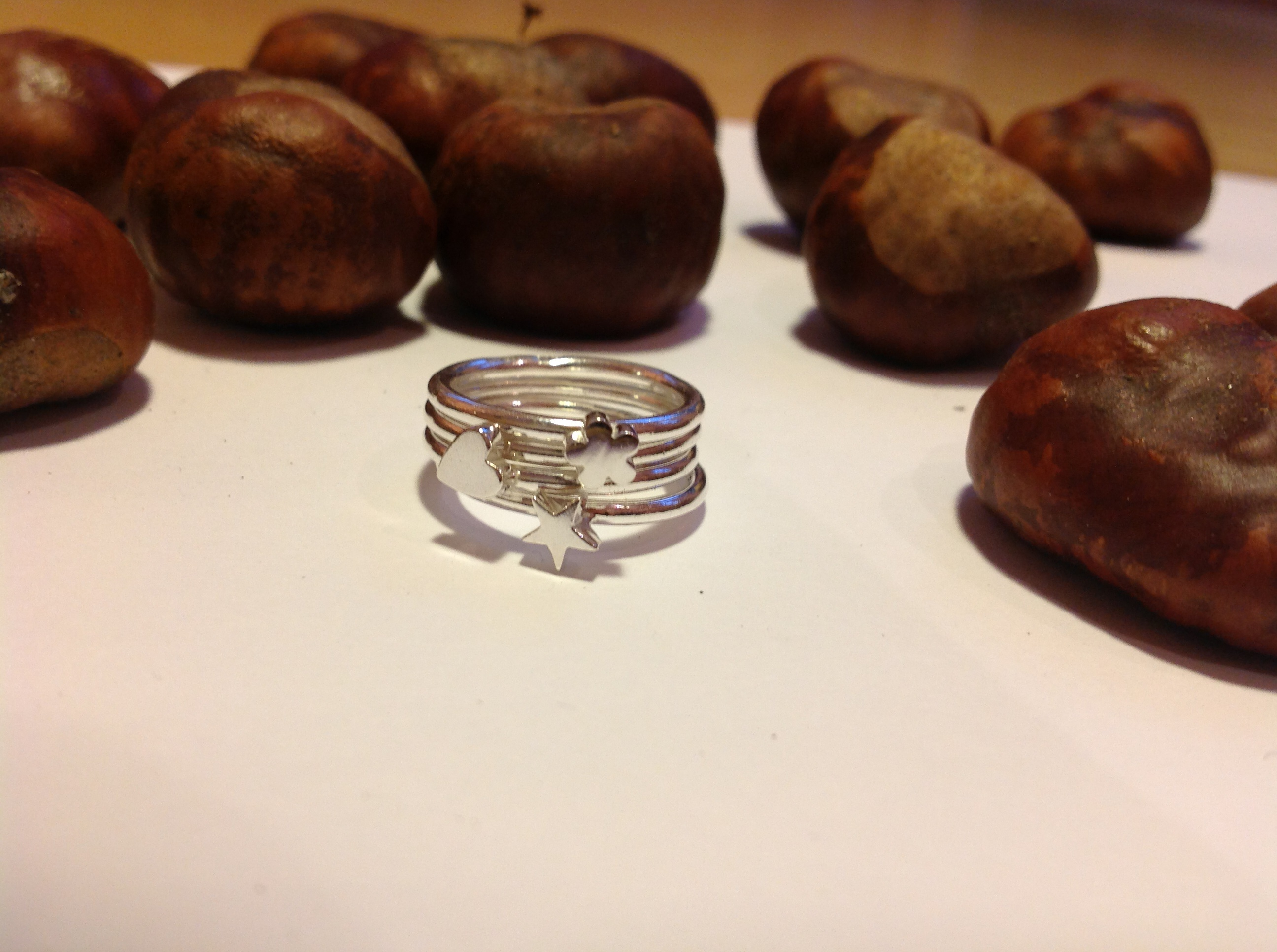 Ring "fyra i en". Hjärta, stjärna, blomma och slät. - 3