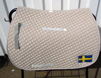 Beige schabrak broderad flagga
