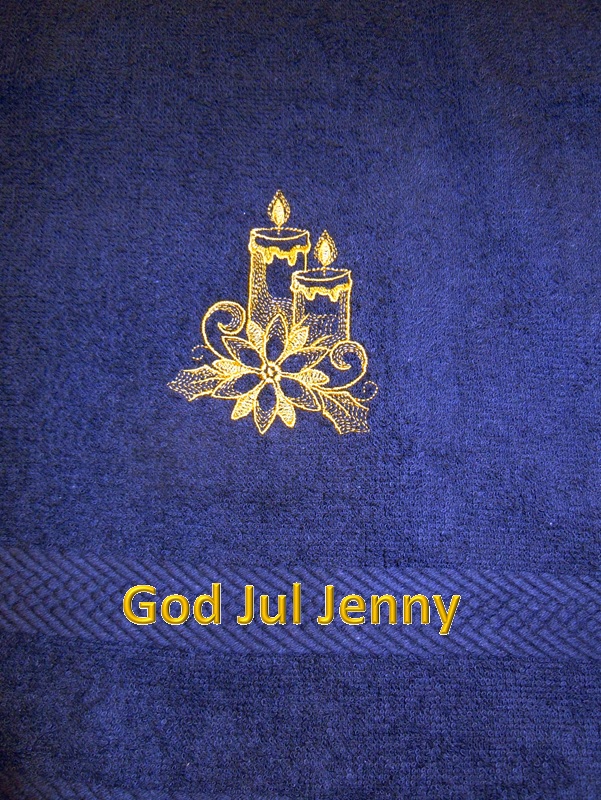 Handduk med ljus och valfri brodyrtext