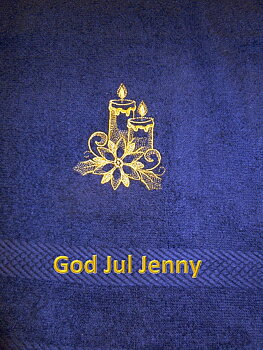 Handduk med ljus och valfri brodyrtext