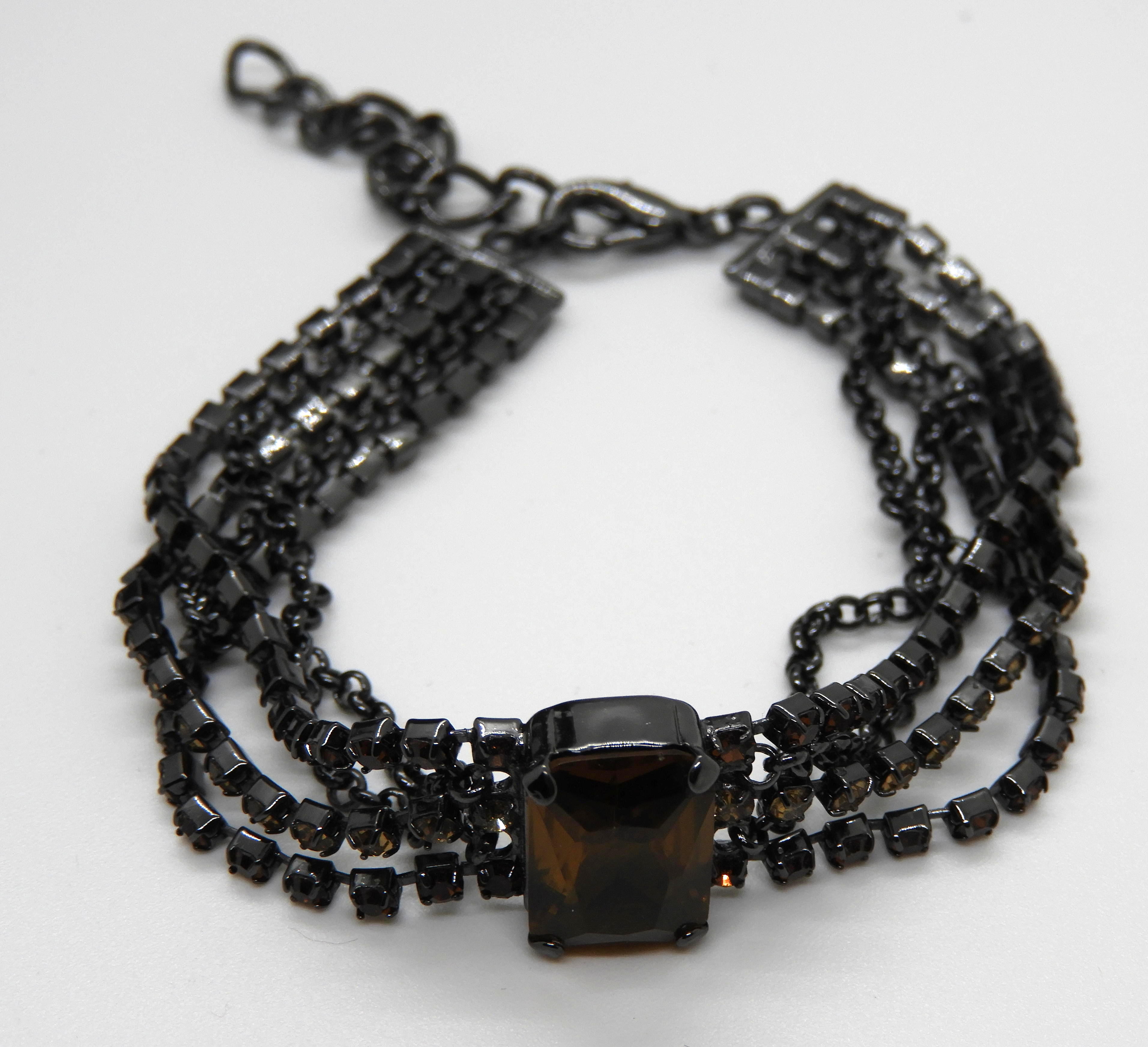 Armband bruna stenar