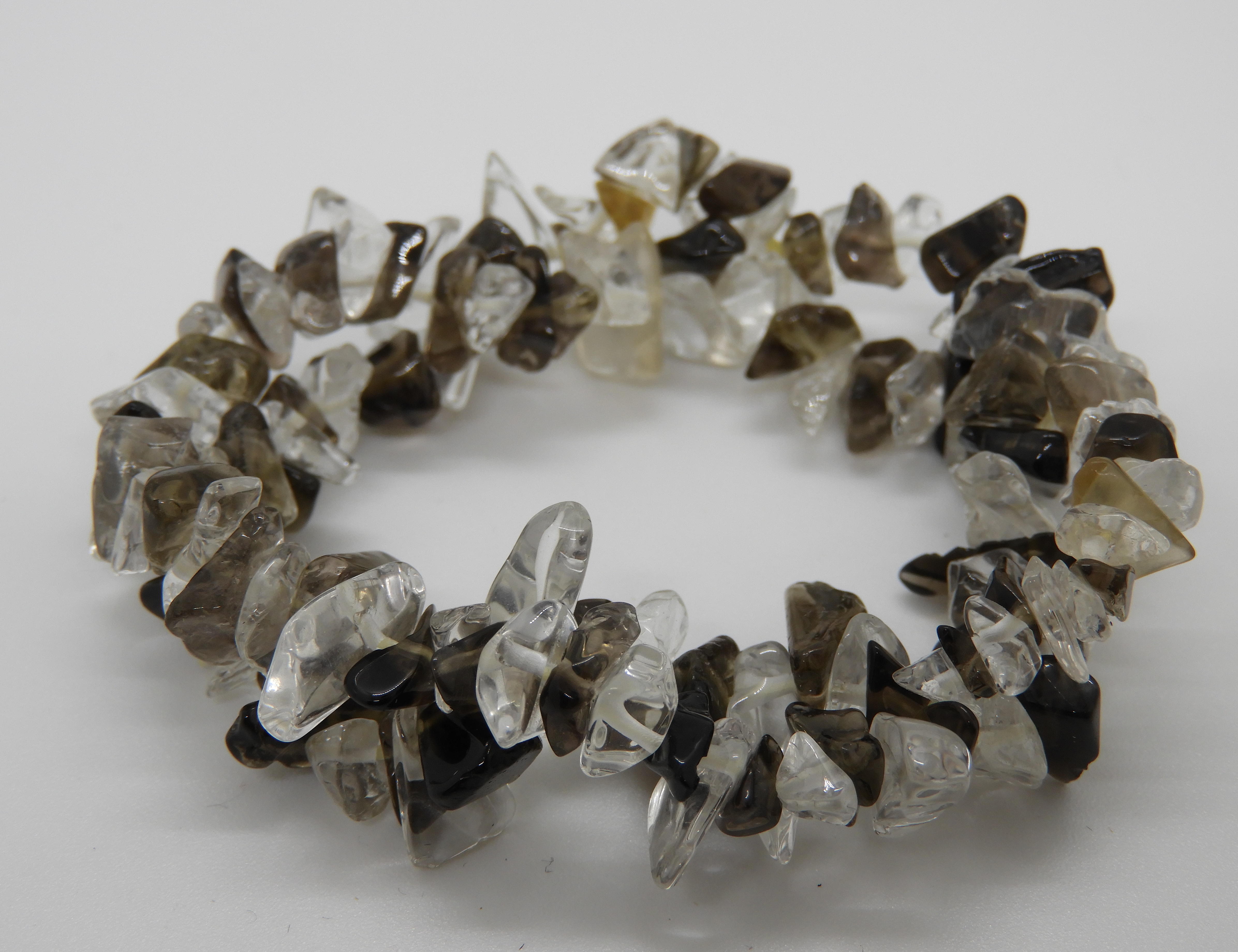Armband olika bruna stenar