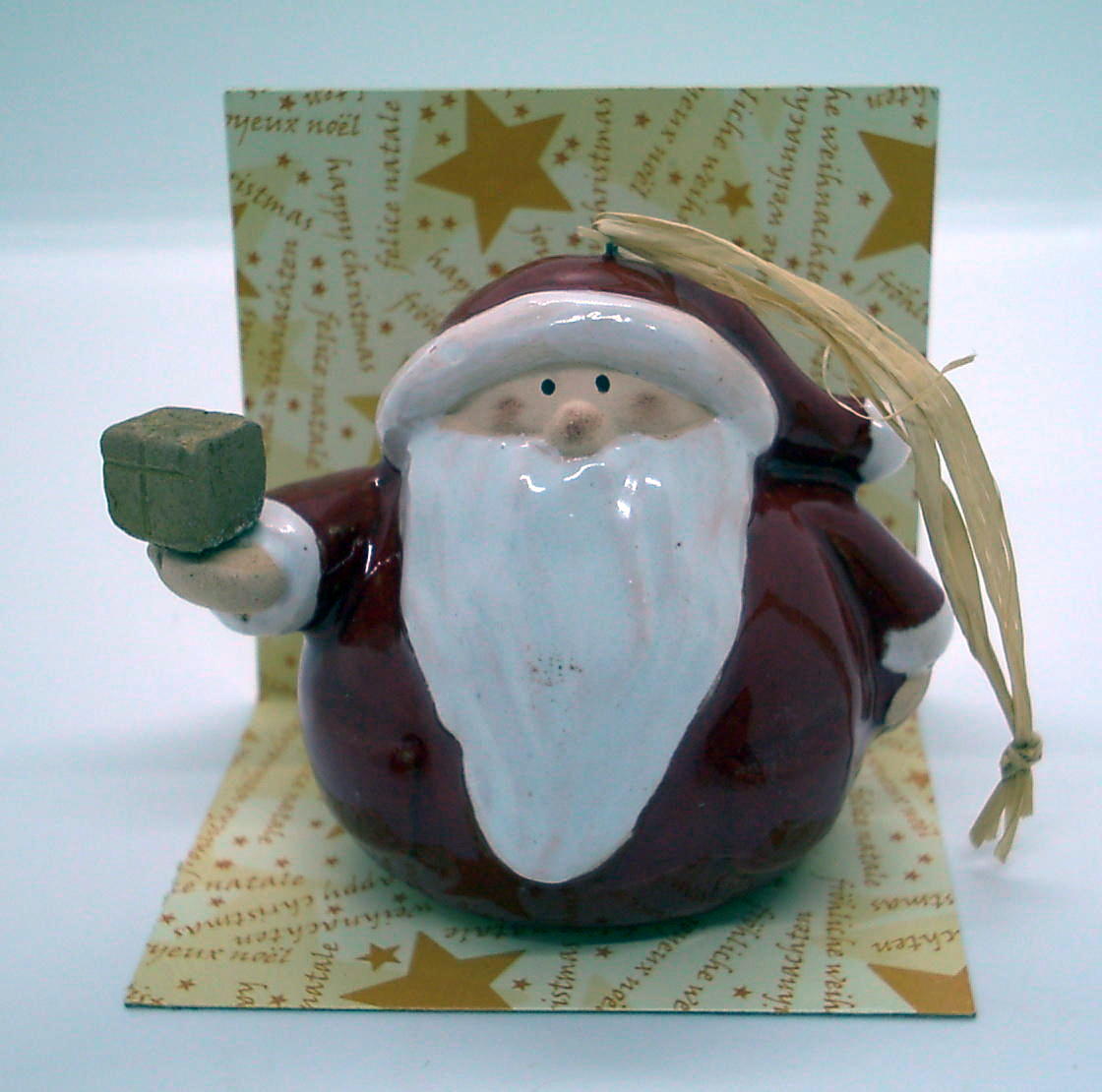 Tomte i keramik att hänga med paket