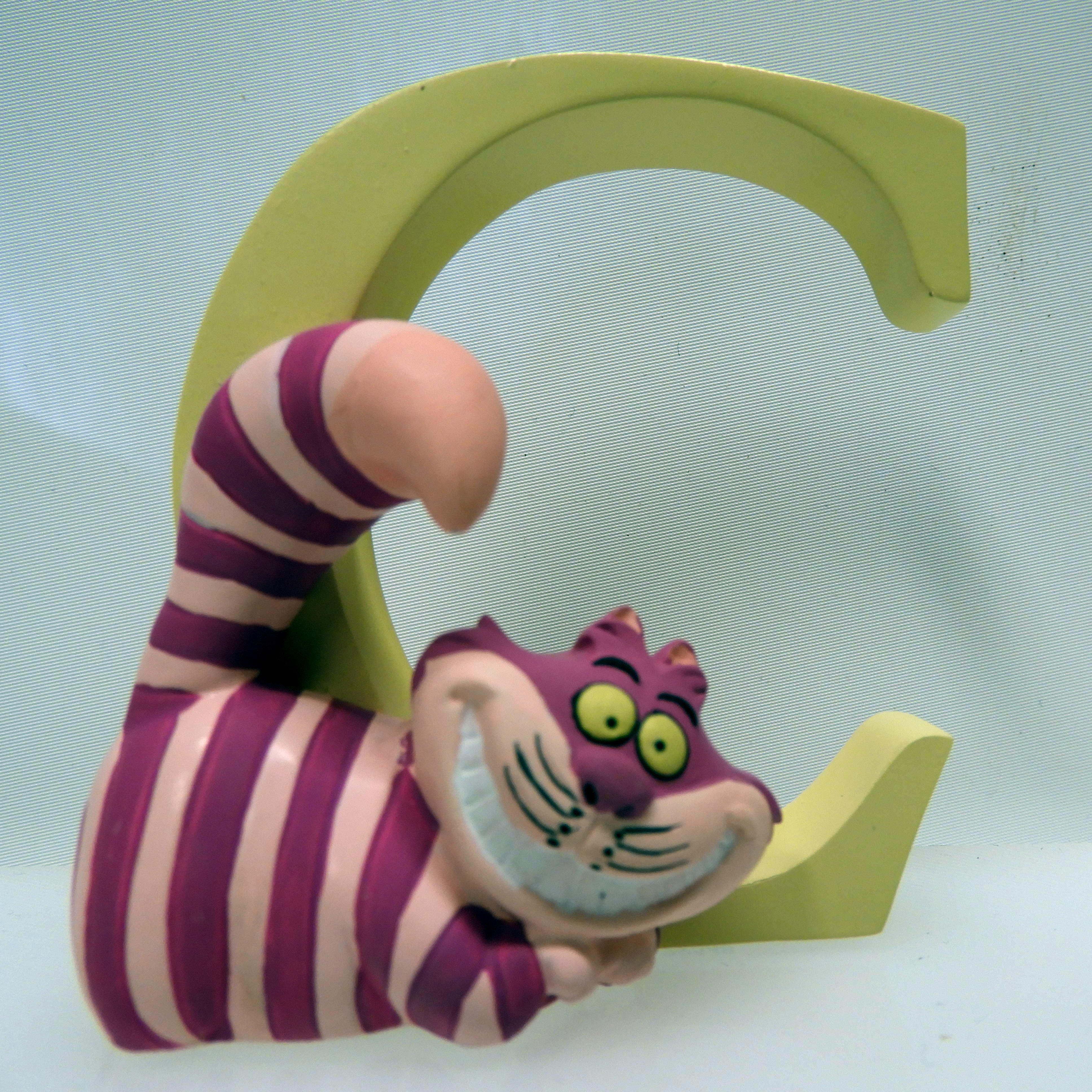 C som i Cheshire Cat