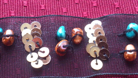 Svart band med paljetter 25 mm