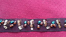 Svart band med paljetter 25 mm