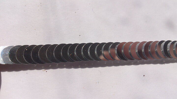 Silverfärgat paljettstretchband 6 mm