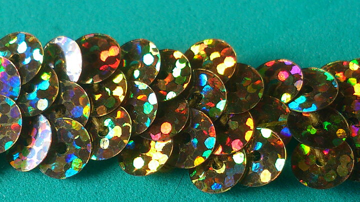 Guldfärgat paljett-stretchband 20 mm