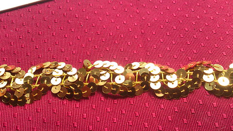 Guldfärgat paljettband 30 mm