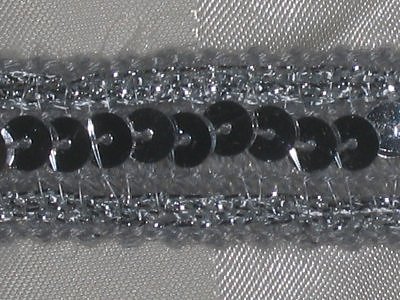 Silverfärgat paljettband 22 mm