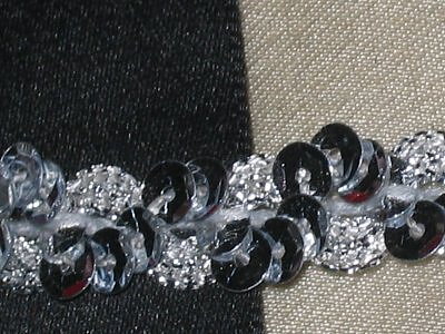 Silverfärgat paljettband 12 mm