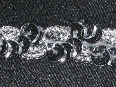 Silverfärgat paljettband 12 mm