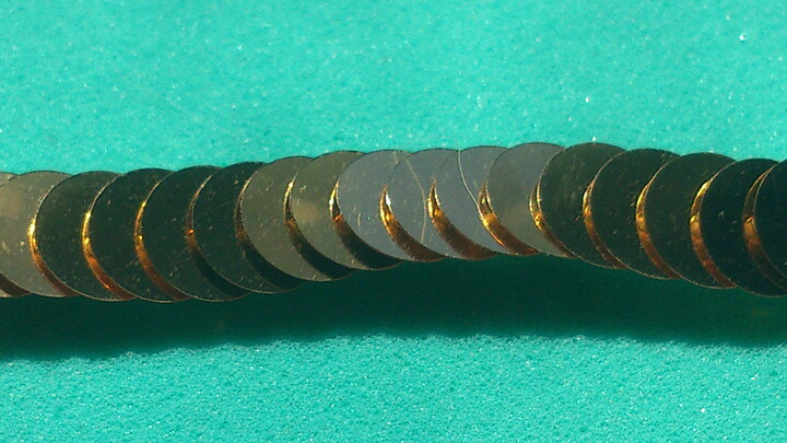 Guldfärgat paljettstretchband 6 mm
