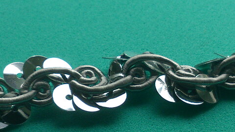 Silverfärgat paljettband 15 mm