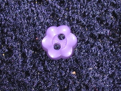 Lila plastknapp Ø = 10 mm