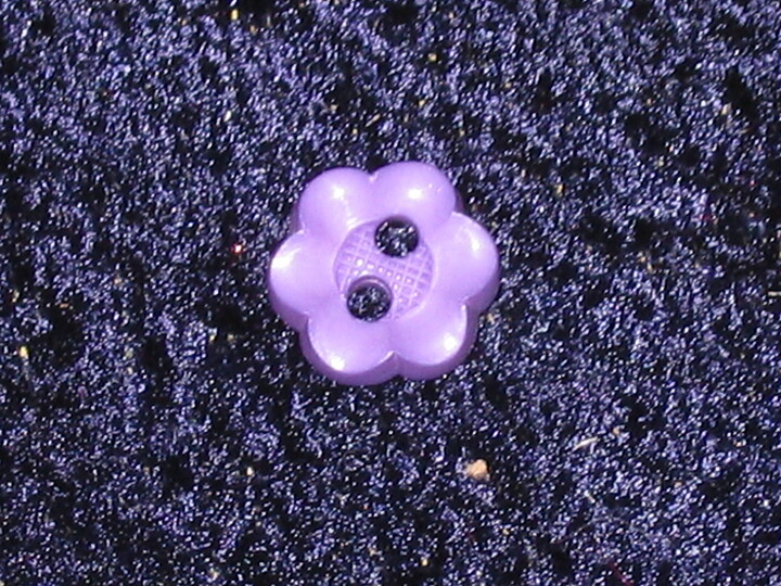 Lila plastknapp Ø = 10 mm