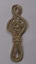 Ljust guldfärgad applikation