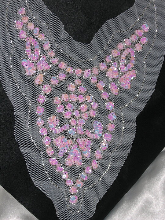 Vit applikation med rosa paljetter (310 x 215 mm)
