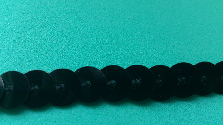 Svart paljettband 8 mm