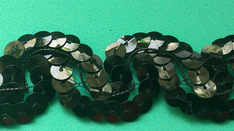 Svart dubbelt paljettband 25 mm