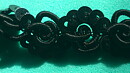 Svart band med paljetter 12 mm