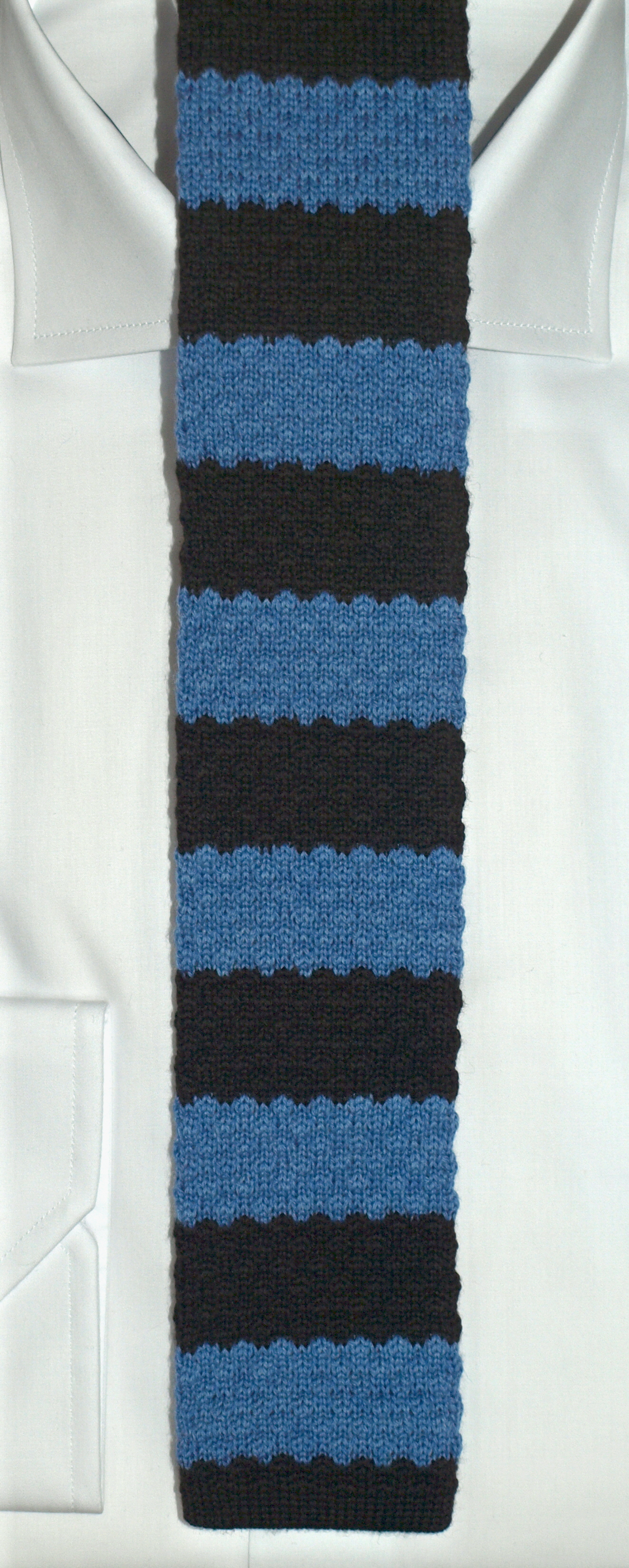 Slips i grovstickad ull - 6 cm (Portia)